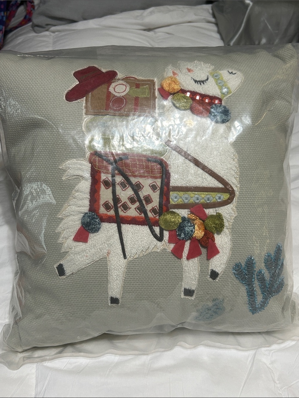 Pier 1 light green Throw Pillow with Embroidered Llama and Multicolor Accents